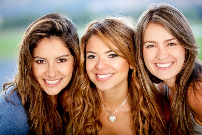 Portrait,Of,A,Group,Of,Beautiful,Female,Friends,Smiling