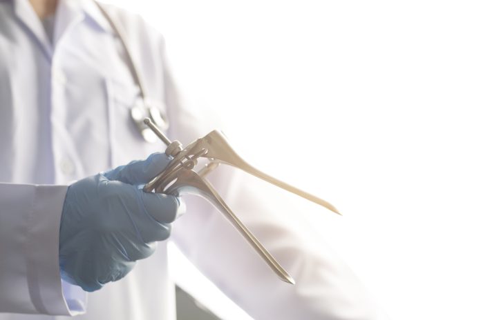 Doctor,Holds,Vaginal,Examination,Device