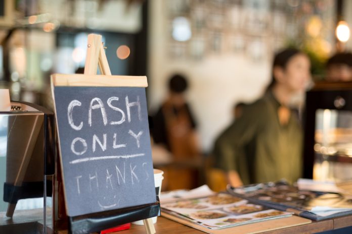 Selected,Focus,Cash,Only,Letter,Showing,On,Counter,Consumer,Purchases