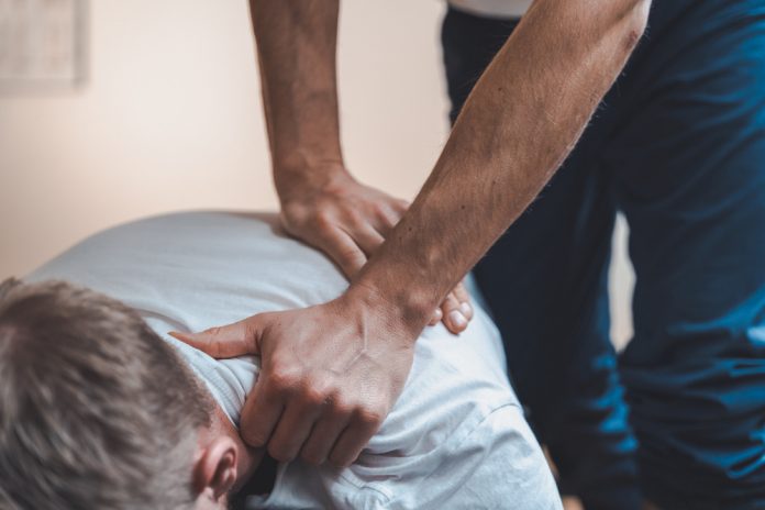 Physiotherapy,Doing,Treatment,For,Various,Physical,Ailments,On,Patient