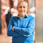 Senior,Grey-haired,Man,With,Arms,Crossed,Smiling,Happy,Standing,At