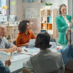 Beautiful,Female,Manager,Holding,A,Meeting,In,A,Conference,Room